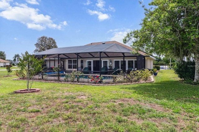 3773 E Lake Todd Dr, Hernando, FL 34442 - rear view of property featuring a lawn, an outdoor pool, and glass enclosure