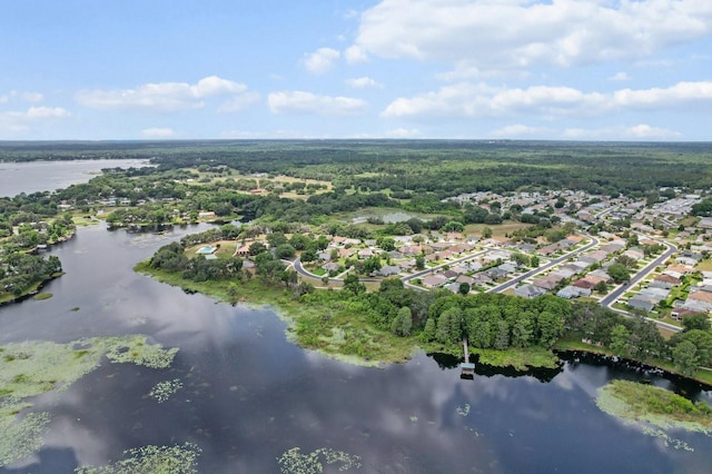 3773 E Lake Todd Dr, Hernando, FL 34442 - aerial view of property and surrounding area with a large body of water, nearby suburban area, and a heavily wooded area