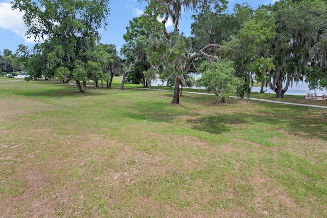 3773 E Lake Todd Dr, Hernando, FL 34442 - view of green lawn featuring view of wooded area