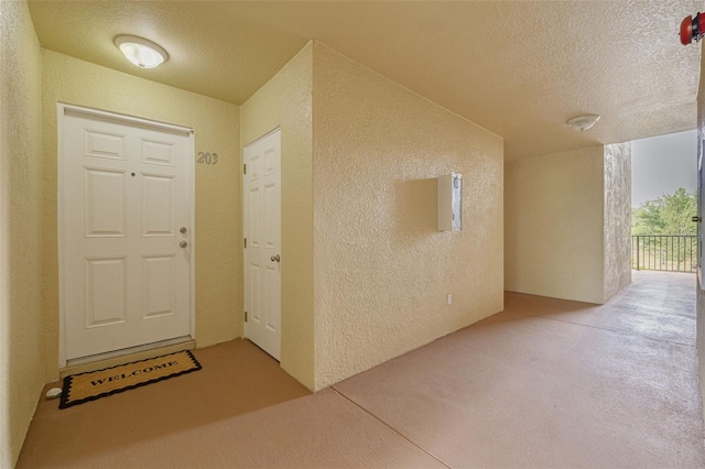 5041 Royal Palms Way Unit 203, New Port Richey, FL 34652 - view of exterior entry with stucco siding