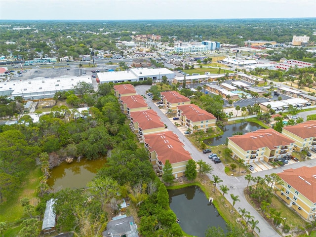 5041 Royal Palms Way Unit 203, New Port Richey, FL 34652 - aerial view of property and surrounding area featuring a large body of water