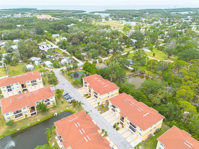 5041 Royal Palms Way Unit 203, New Port Richey, FL 34652 - aerial perspective of suburban area with a large body of water