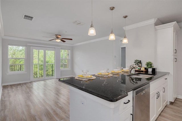 5041 Royal Palms Way Unit 203, New Port Richey, FL 34652 - kitchen featuring stainless steel dishwasher, a sink, a peninsula, open floor plan, and crown molding