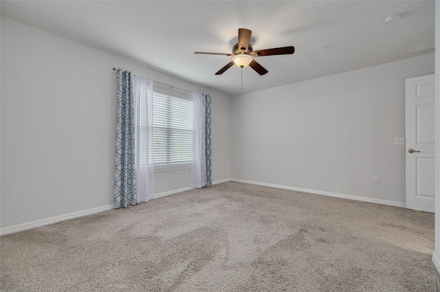 5041 Royal Palms Way Unit 203, New Port Richey, FL 34652 - unfurnished room featuring ceiling fan, carpet, and baseboards