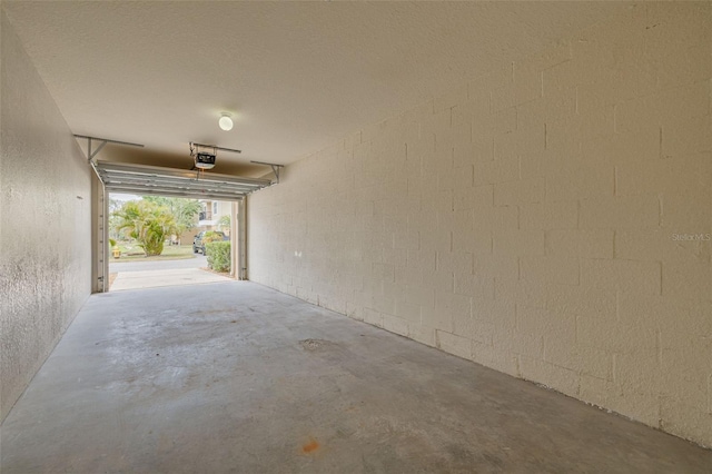 5041 Royal Palms Way Unit 203, New Port Richey, FL 34652 - garage with a garage door opener