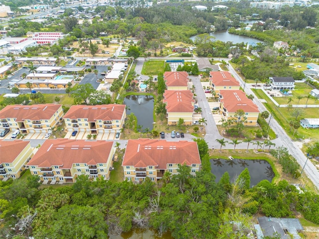 5041 Royal Palms Way Unit 203, New Port Richey, FL 34652 - aerial overview of property's location featuring a large body of water and nearby suburban area