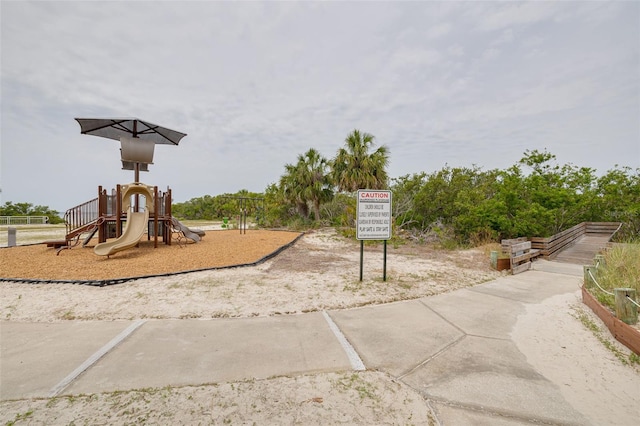 5041 Royal Palms Way Unit 203, New Port Richey, FL 34652 - view of communal playground