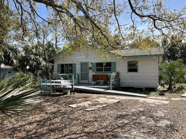 1226 Hawthorne Ave, Cedar Key, FL 32625 - rear view of property with a wooden deck