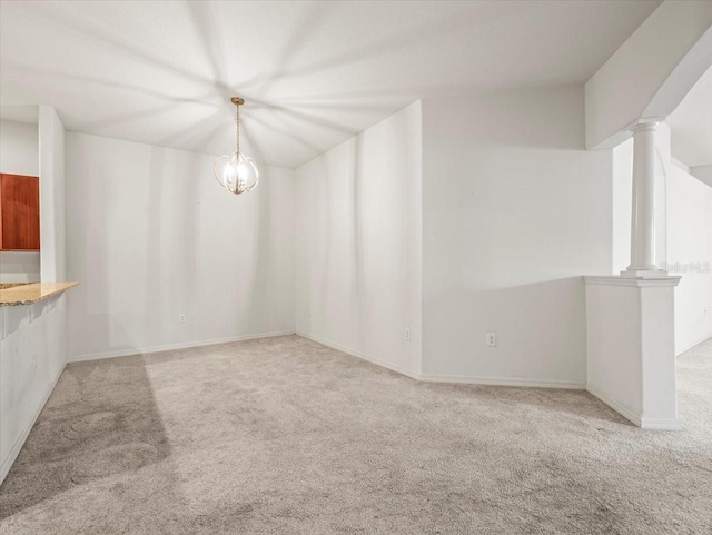 3885 Crossline Dr, Spring Hill, FL 34609 - spare room with carpet and decorative columns