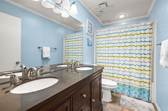 full bath featuring ornamental molding, curtained shower, toilet, double vanity, and stone finish flooring