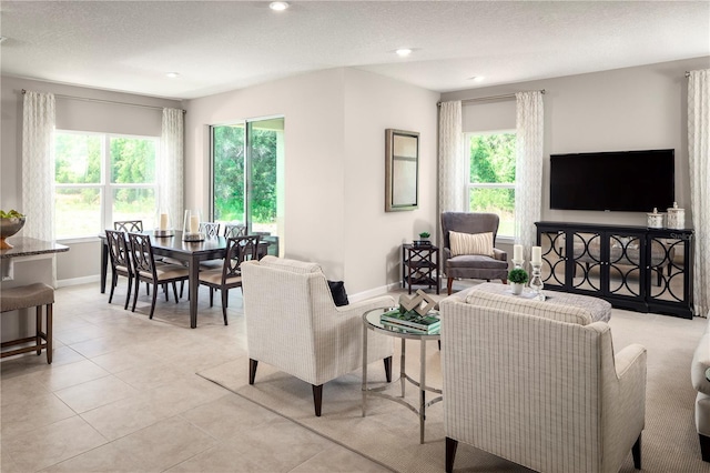 2193 Aibonito Cir, Clermont, FL 34711 - living area featuring baseboards, recessed lighting, light tile patterned flooring, and a textured ceiling