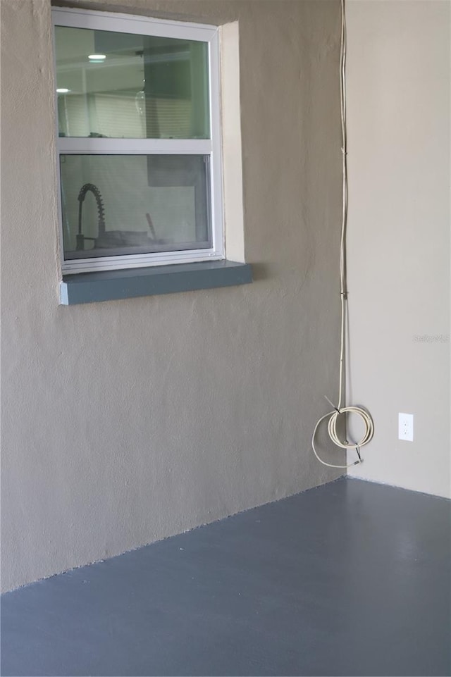 empty room featuring concrete floors