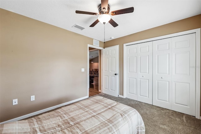 1161 Crk 443, Lake Panasoffkee, FL 33538 - bedroom with carpet floors, a closet, baseboards, and a ceiling fan