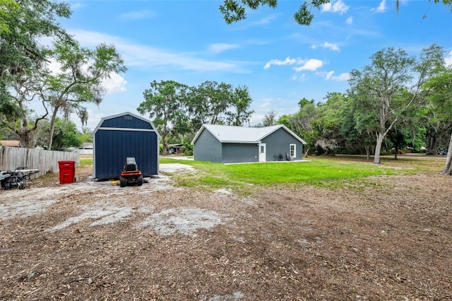 1161 Crk 443, Lake Panasoffkee, FL 33538 - view of yard featuring an outdoor structure and a storage unit