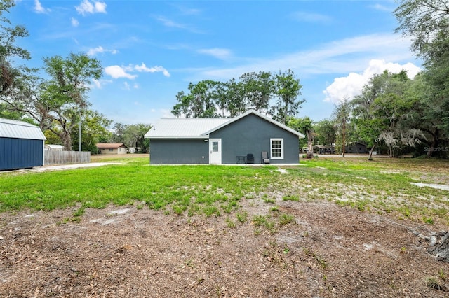 1161 Crk 443, Lake Panasoffkee, FL 33538 - back of house with metal roof