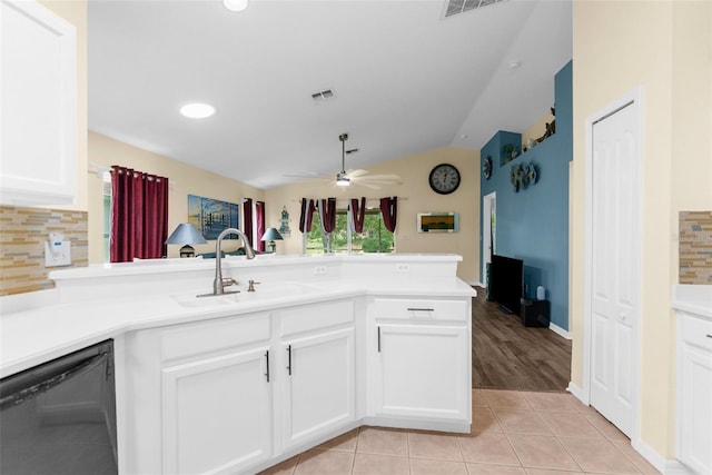 261 Rochester St, Spring Hill, FL 34609 - kitchen featuring a sink, dishwasher, lofted ceiling, backsplash, and a ceiling fan
