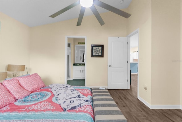 261 Rochester St, Spring Hill, FL 34609 - bedroom with baseboards, wood finished floors, and ensuite bath