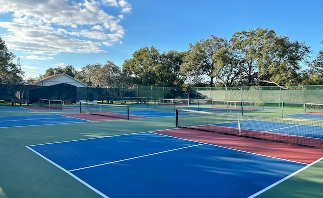 261 Rochester St, Spring Hill, FL 34609 - view of tennis court with community basketball court and fence