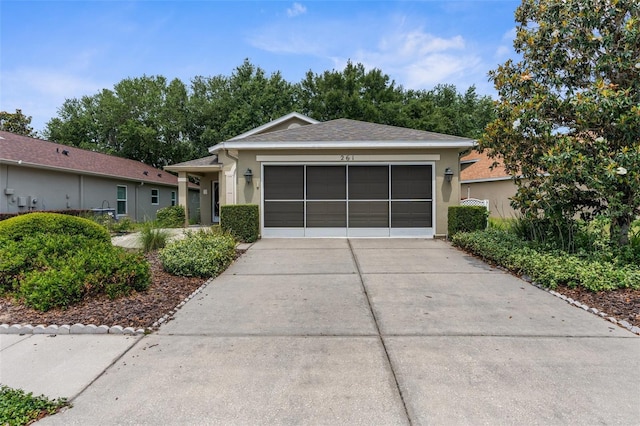 261 Rochester St, Spring Hill, FL 34609 - single story home featuring concrete driveway, an attached garage, and stucco siding