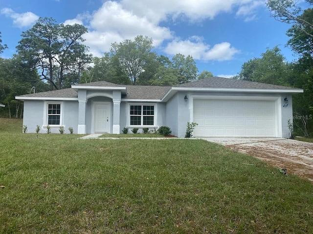 9252 N Agatha Dr, Citrus Springs, FL 34434 - single story home featuring driveway, stucco siding, a front yard, a garage, and a shingled roof