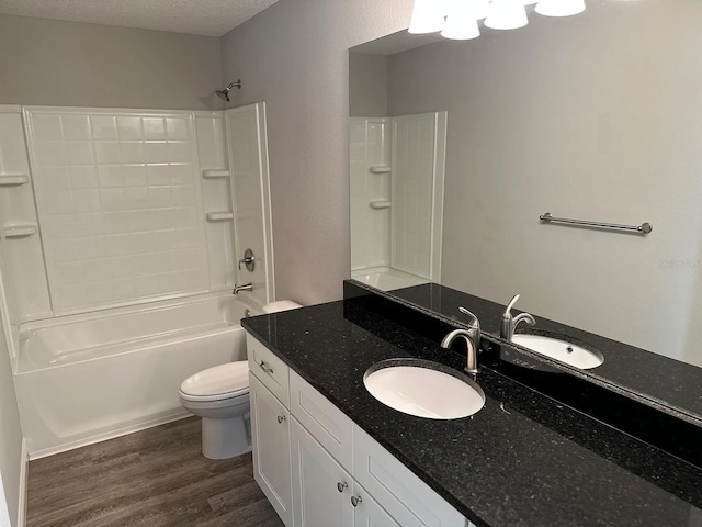 9252 N Agatha Dr, Citrus Springs, FL 34434 - full bath featuring wood finished floors, toilet, bathing tub / shower combination, and vanity