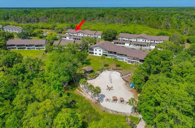 drone / aerial view of a heavily wooded area