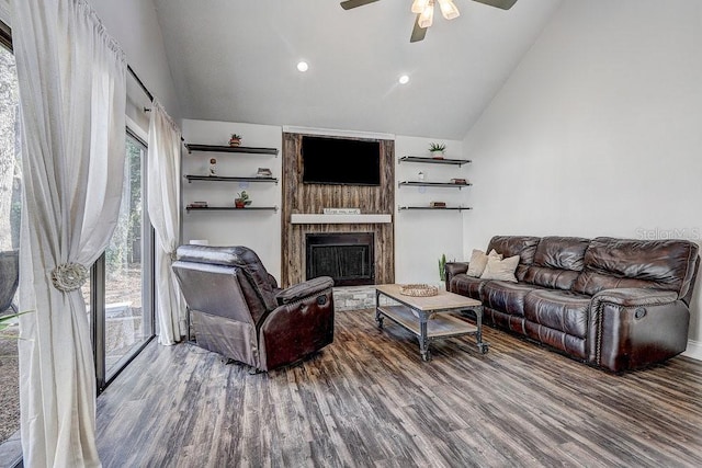 10910 Winter Oak Pl, Tampa, FL 33618 - living area featuring lofted ceiling, a fireplace, a ceiling fan, wood finished floors, and recessed lighting