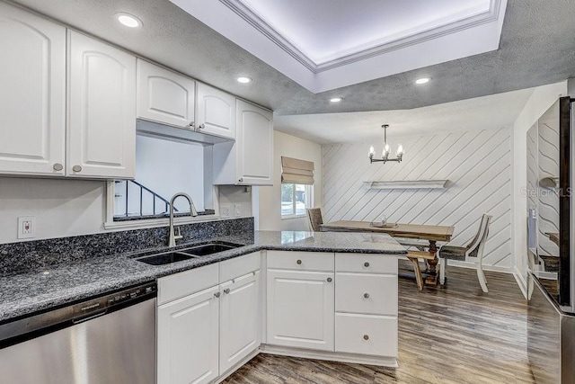 10910 Winter Oak Pl, Tampa, FL 33618 - kitchen featuring dishwasher, a sink, a chandelier, white cabinets, and recessed lighting