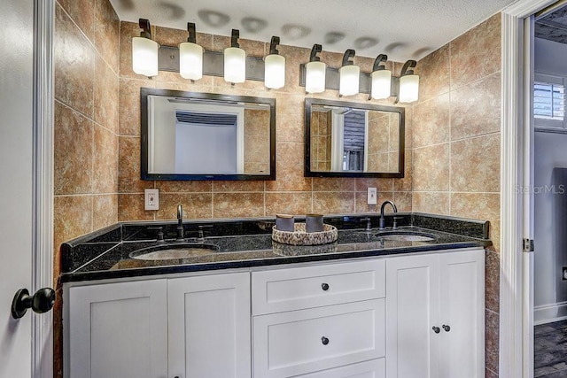 10910 Winter Oak Pl, Tampa, FL 33618 - bathroom with double vanity and tile walls