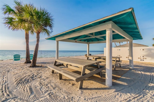 view of home's community featuring a water view and a gazebo