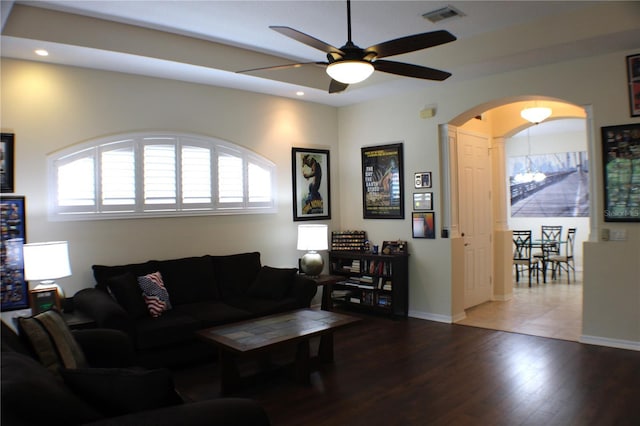 4837 Rainbow Race, New Port Richey, FL 34652 - living area featuring a ceiling fan, recessed lighting, arched walkways, wood finished floors, and baseboards