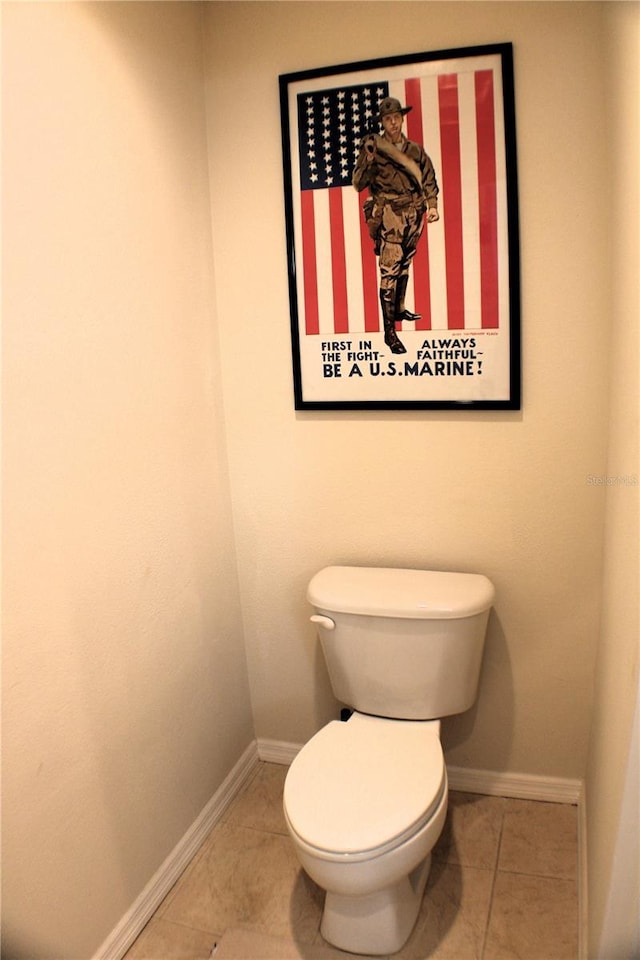 4837 Rainbow Race, New Port Richey, FL 34652 - bathroom featuring tile patterned flooring, baseboards, and toilet
