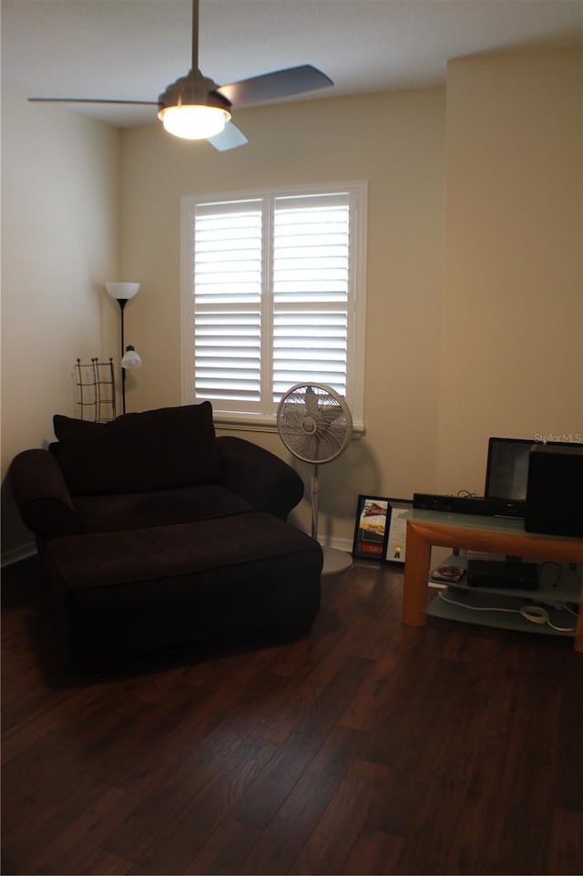 4837 Rainbow Race, New Port Richey, FL 34652 - living area featuring a ceiling fan and dark wood finished floors