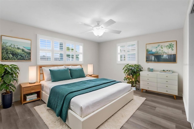 13411 Lisa Dr, Hudson, FL 34667 - bedroom featuring wood finished floors and a ceiling fan