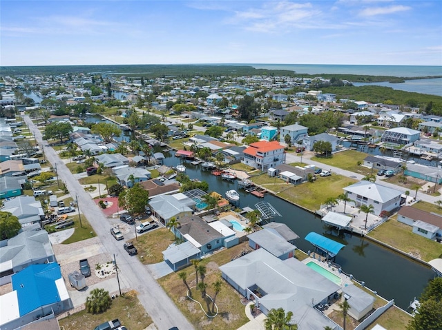 13411 Lisa Dr, Hudson, FL 34667 - aerial overview of property's location with a large body of water and nearby suburban area