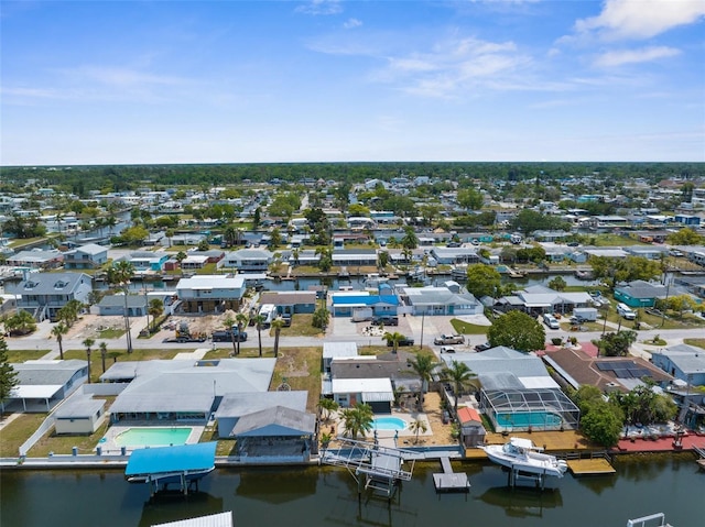 13411 Lisa Dr, Hudson, FL 34667 - aerial perspective of suburban area featuring a large body of water