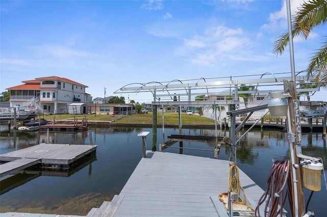 13411 Lisa Dr, Hudson, FL 34667 - dock featuring a water view and boat lift