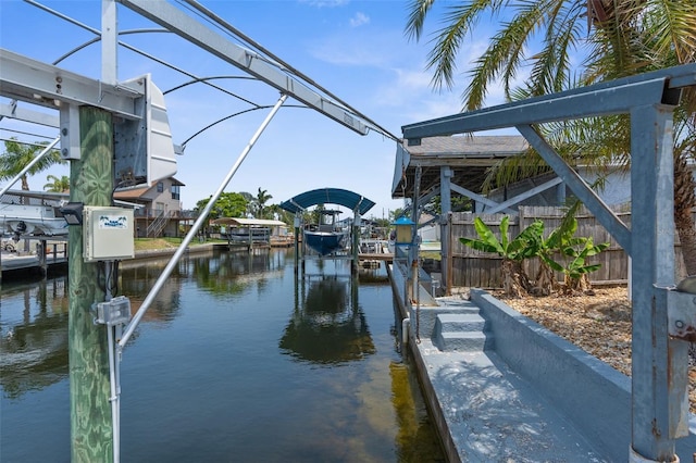 13411 Lisa Dr, Hudson, FL 34667 - dock area with boat lift and a water view