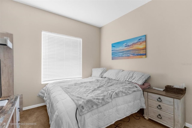 carpeted bedroom with baseboards