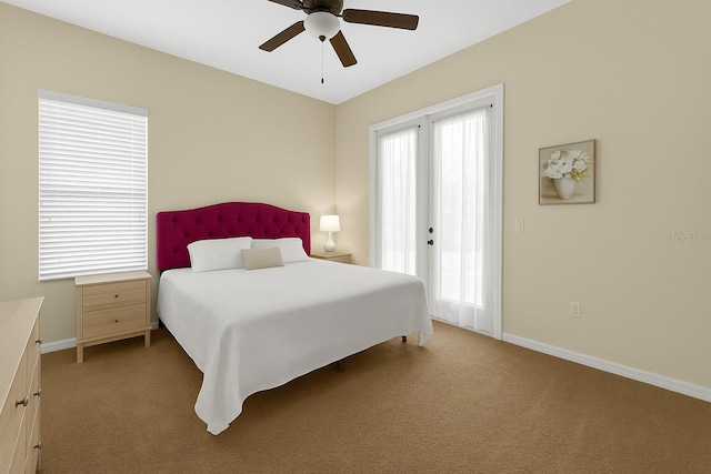 bedroom with light carpet, baseboards, and ceiling fan