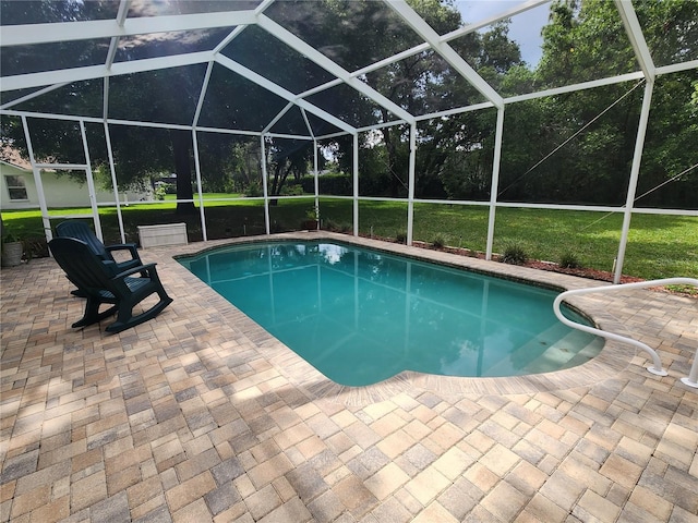 outdoor pool featuring a patio area and a lanai