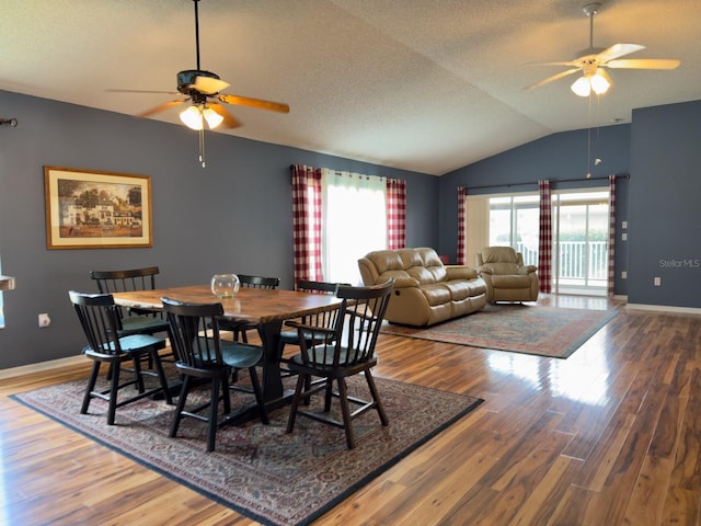 18109 Webster Grove Dr, Hudson, FL 34667 - dining area with ceiling fan, wood finished floors, lofted ceiling, baseboards, and a textured ceiling