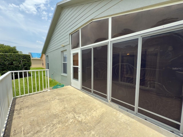 18109 Webster Grove Dr, Hudson, FL 34667 - view of patio with a balcony