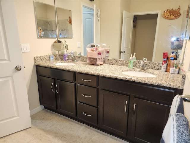 bathroom featuring double vanity