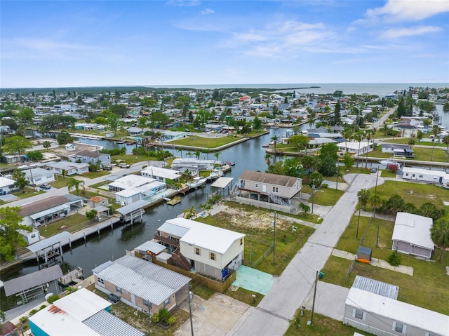 6802 Curlew Ln, Hudson, FL 34667 - aerial perspective of suburban area with a large body of water