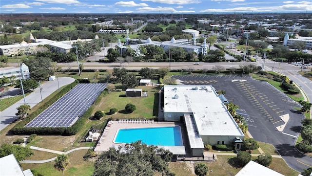 drone / aerial view of a pool area