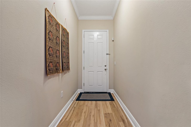 11401 Quiet Forest Dr, Tampa, FL 33635 - doorway to outside with crown molding, wood finished floors, and baseboards