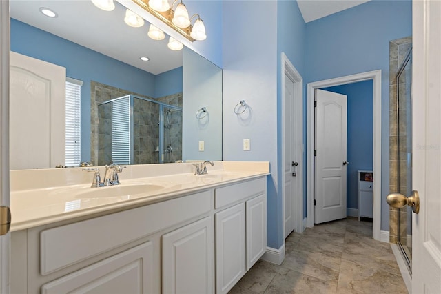 11401 Quiet Forest Dr, Tampa, FL 33635 - bathroom with a shower stall, double vanity, and baseboards
