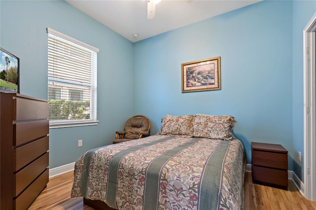 11401 Quiet Forest Dr, Tampa, FL 33635 - bedroom with wood finished floors, baseboards, and ceiling fan