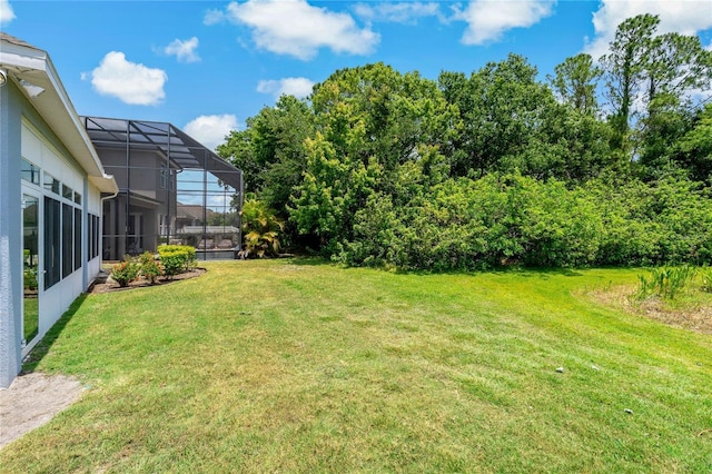 11401 Quiet Forest Dr, Tampa, FL 33635 - view of green lawn with a lanai